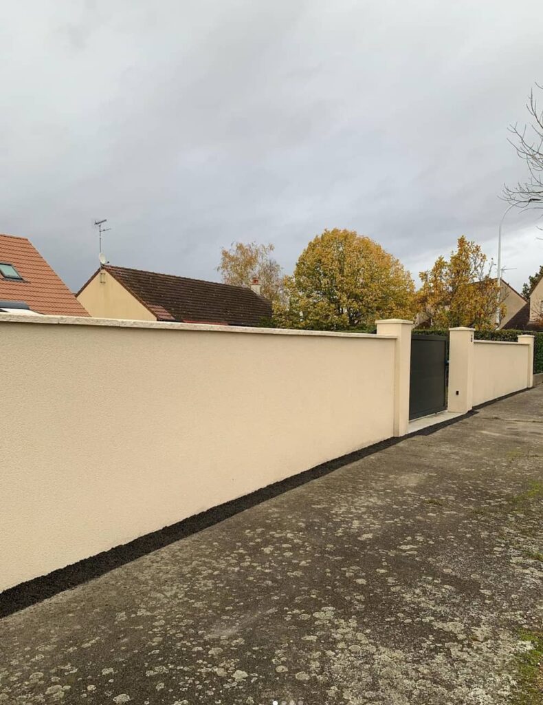 construction muret de clôture